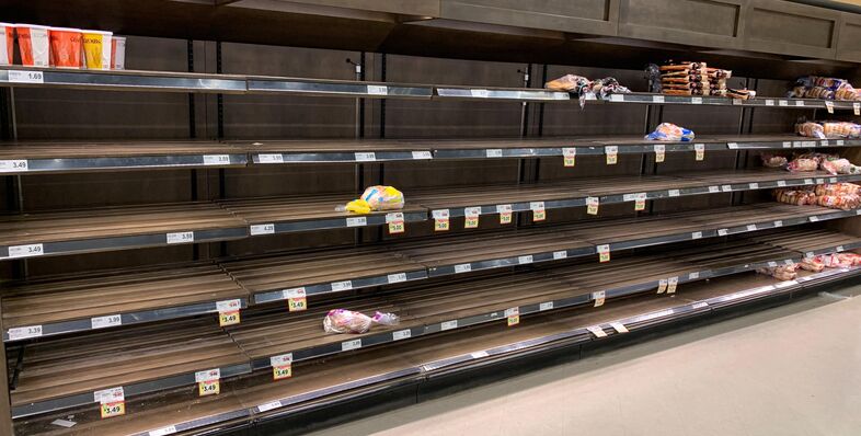 Empty shelves in a grocery store