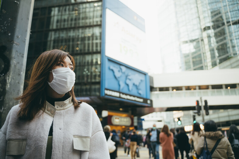 A photo of a woman wearing a mask in China