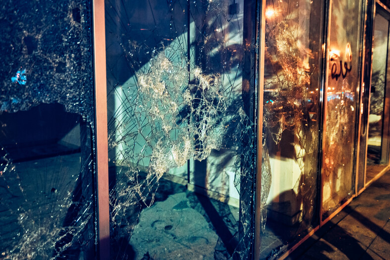 A photo of shattered window panes