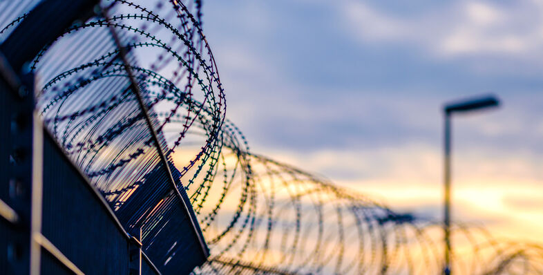 A photo of a prison fence