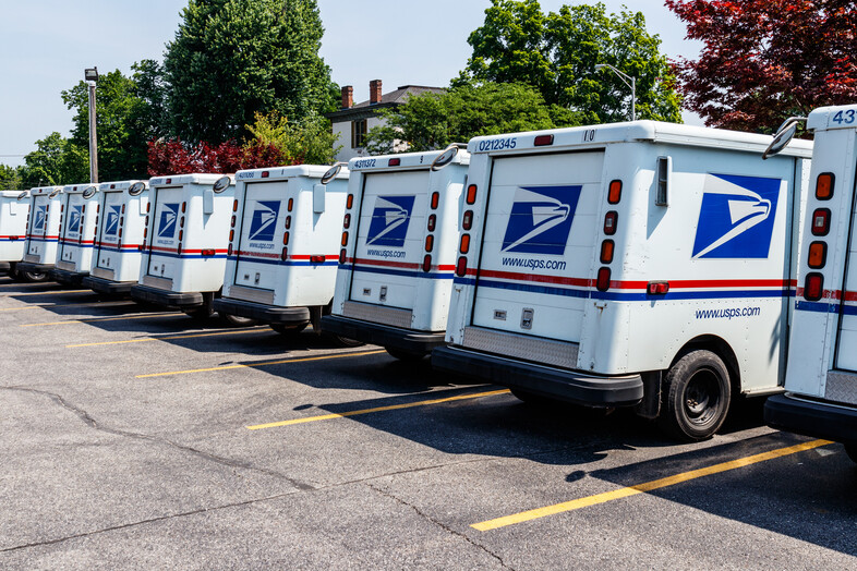 A line of Post Office trucks