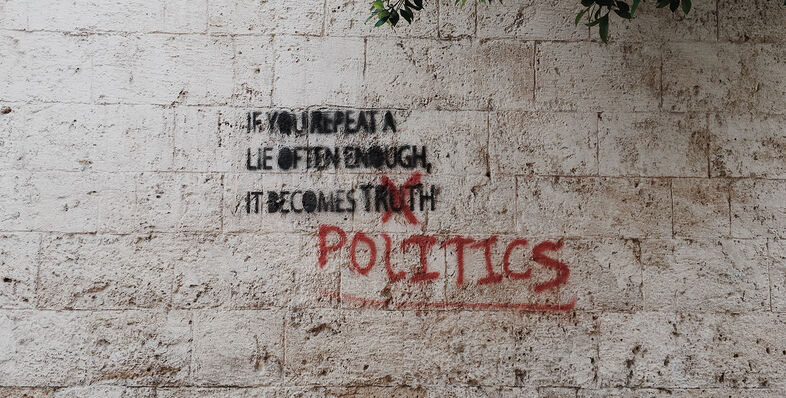 If you repeat a lie often enough it becomes truth printed wall taken at daytime